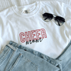 white Cheer Mom sports shirt with jeans and sunglasses