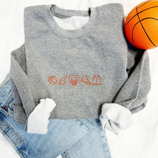 Gray sweatshirt with sports-themed icons on a white background