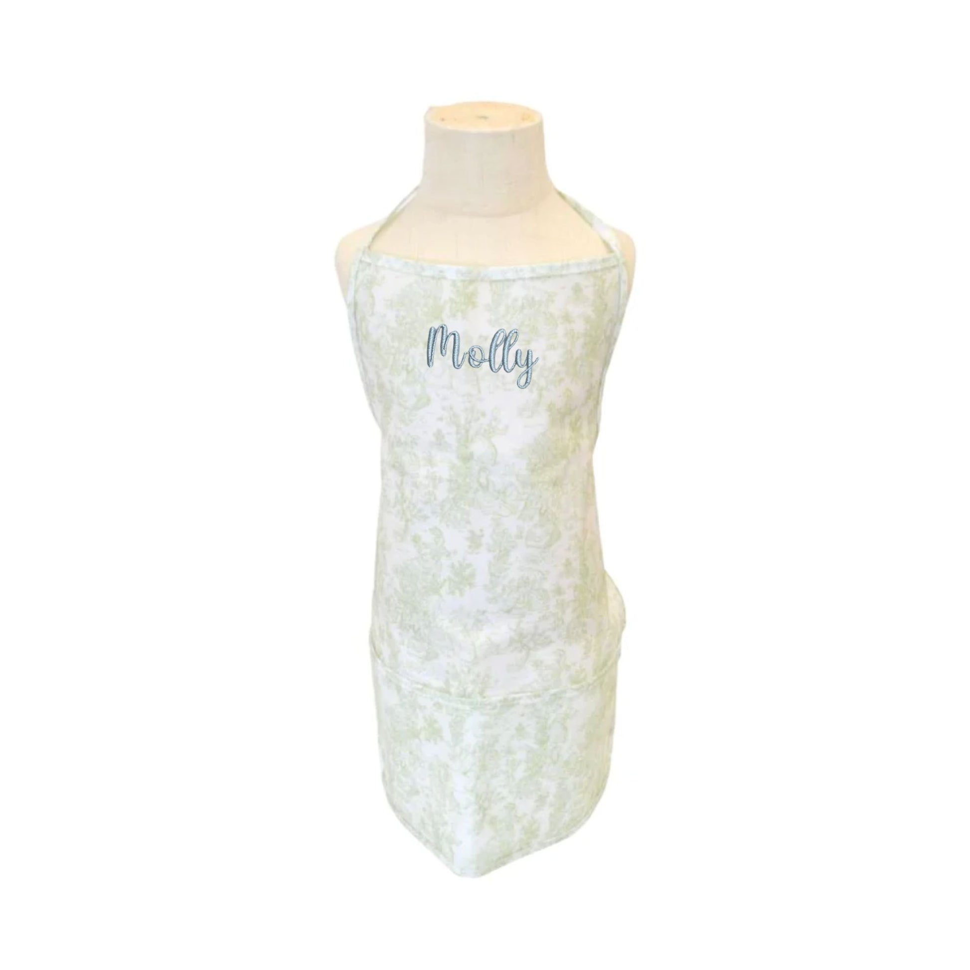 Bunny toile green kids apron with custom name embroidery in jelly font and powder blue thread