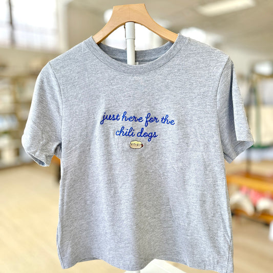 athletic heather bella and canvas boxy tee with a cute script just here for the chili dogs embroidered design on the center chest