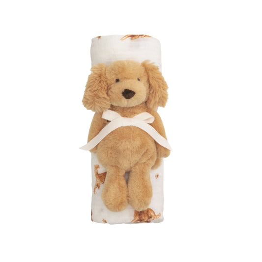 Plush dog toy wrapped in a blanket with a white background