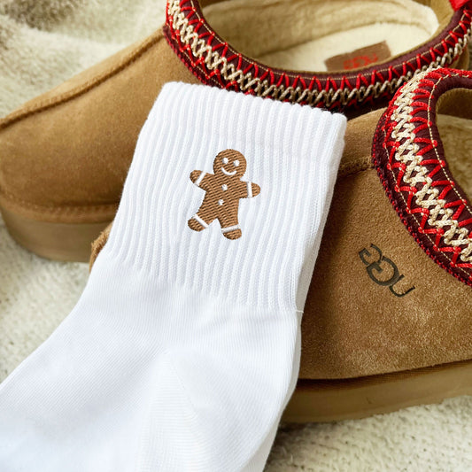 white crew socks with embroidered gingerbread man design