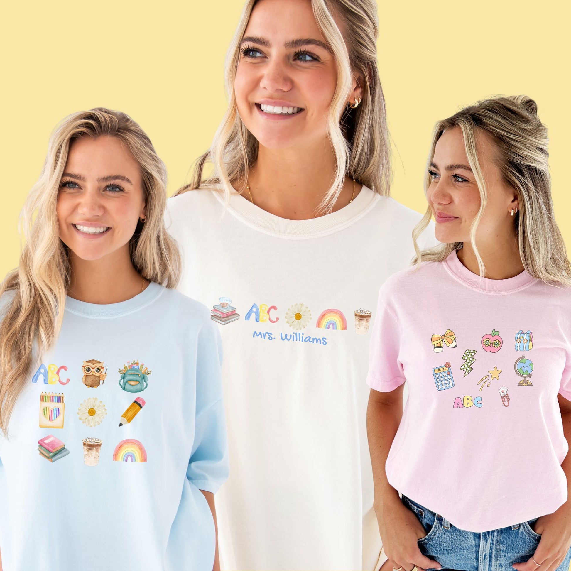 Three women wearing t-shirts with various charm printed designs on a yellow background
