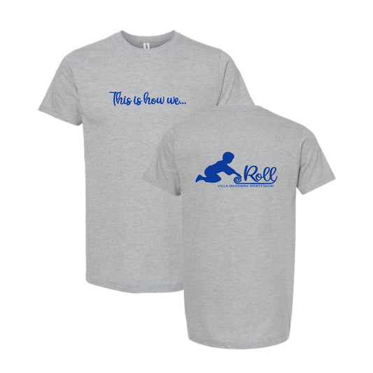 Two heather gray short-sleeve t-shirts shown on a white background, with the front view on the left and back view on the right. The front has blue script text reading 'This is how we.