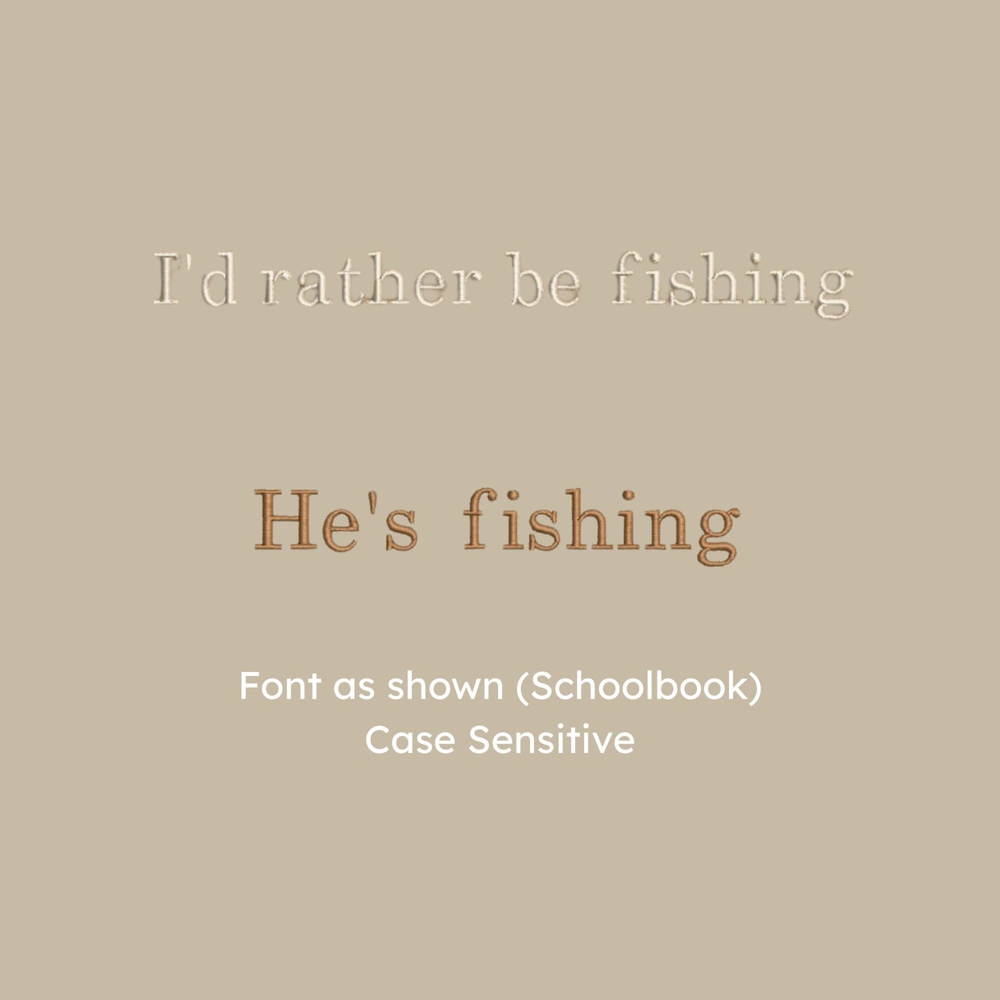 detail photo of a "I'd rather be fishing" and "he's fishing" design in schoolbook font and natural/chestnut thread
