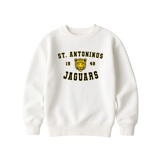An off-white crewneck sweatshirt featuring a yellow and black 'St. Antoninus Jaguars' graphic with a jaguar head mascot on the chest, displayed against a solid white background.