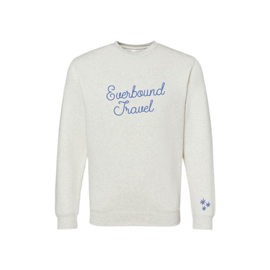 White sweatshirt with 'Everbound Travel' text embroidered on the front and stars on the cuff on a white background