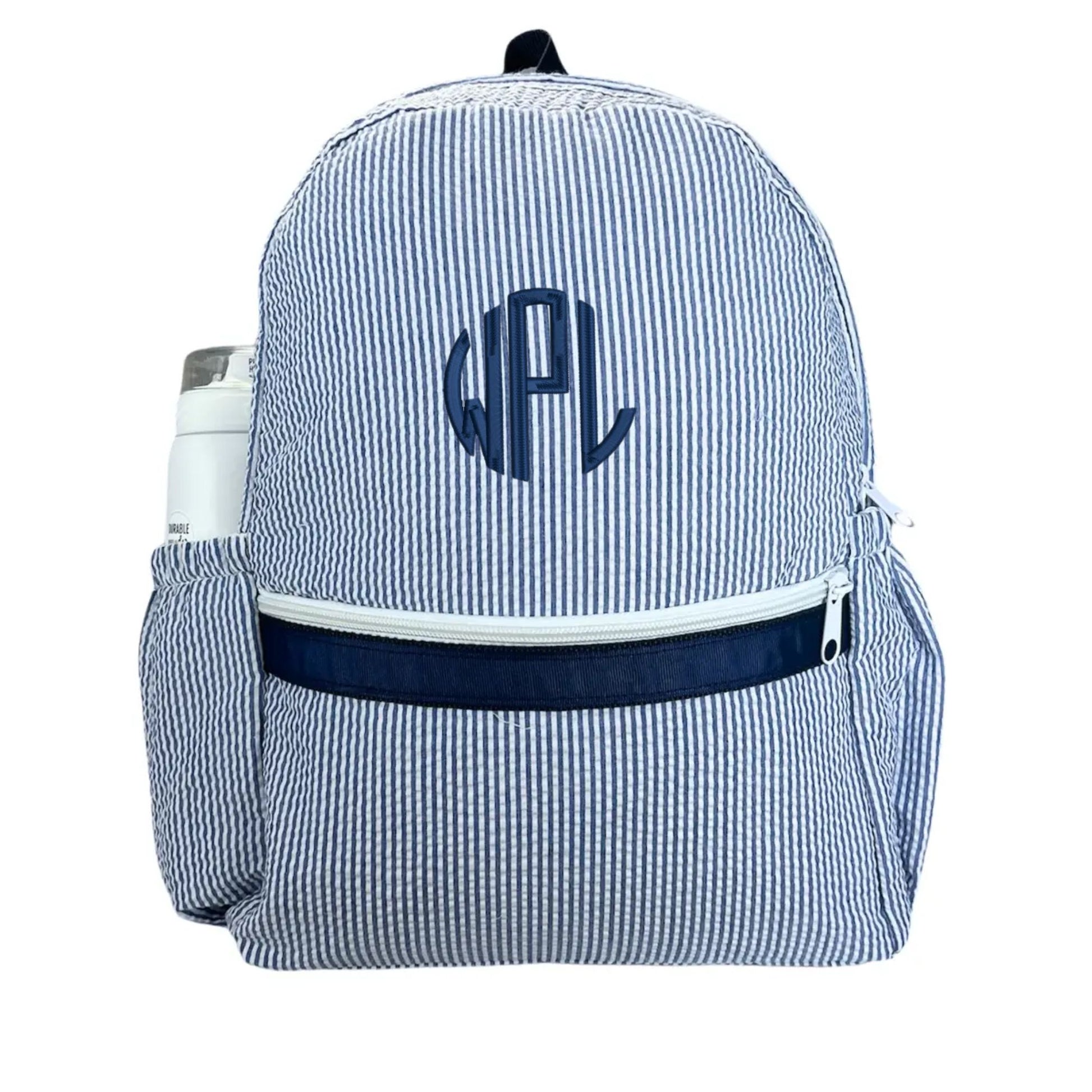 navy and white seersucker kids backpack with front zippered pocket and side water bottle pocket
