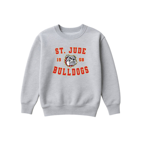 A light gray crewneck sweatshirt featuring a red and white graphic on the chest that reads 'ST. JUDE BULLDOGS' with '1958' and a bulldog mascot logo in the center.