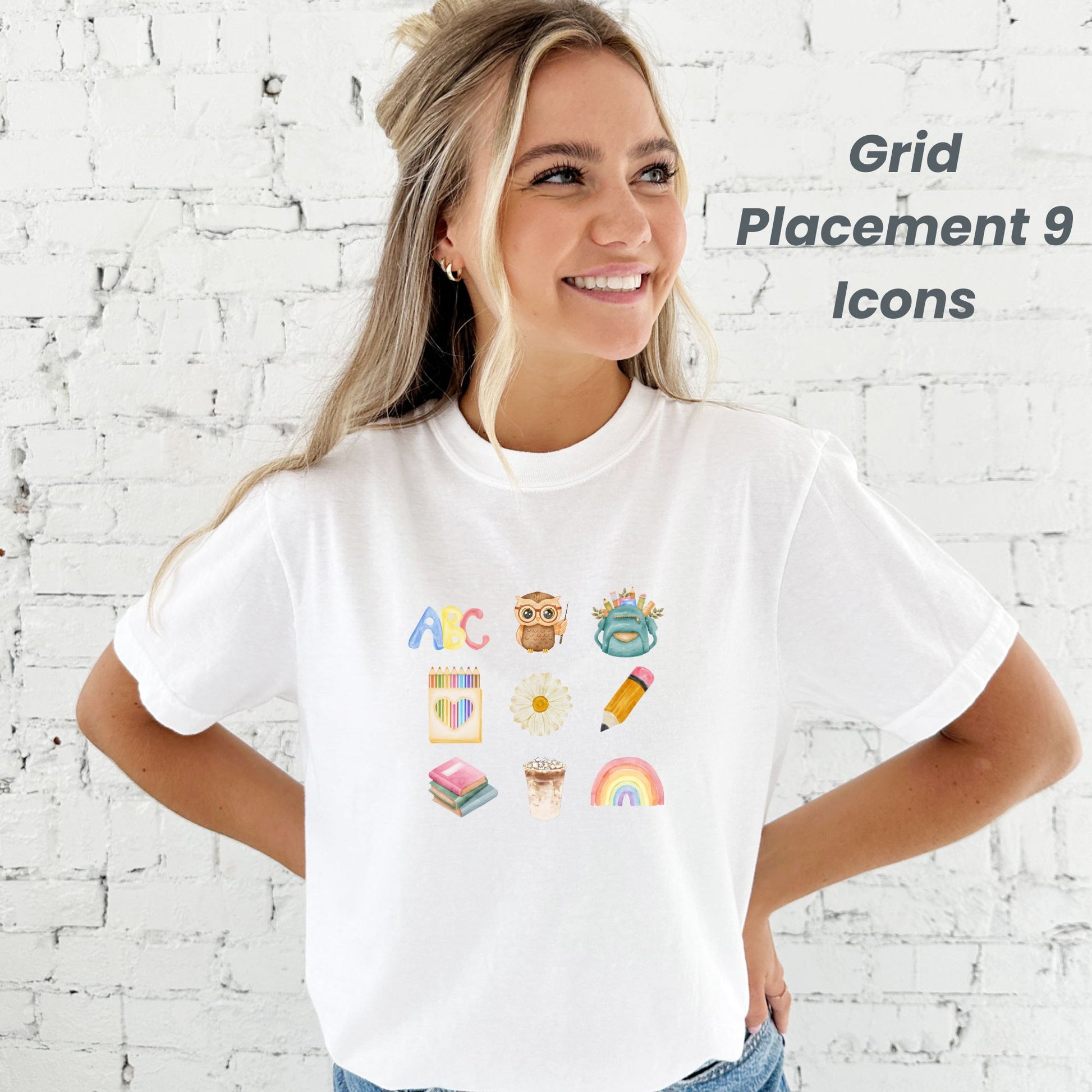 woman standing in front of a white brick wall wearing a white comfort colors tank top with cute watercolor teacher icons in a grid pattern printed on the center chest