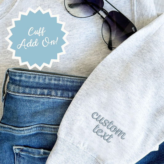 sweatshirt with custom text embroidered on the sleeve