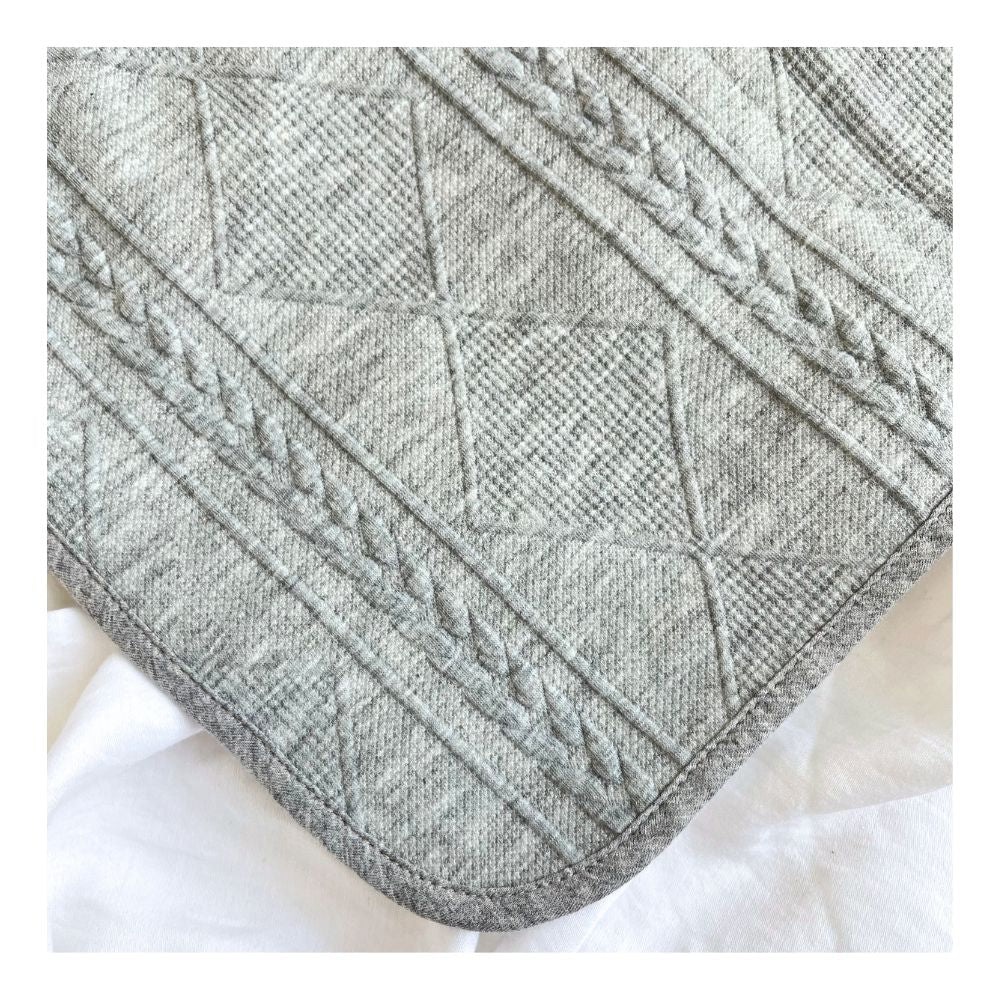 grey knitted blanket