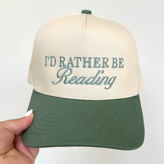 two tone canvas trucker hat with a sage green brim and I'd Rather Be Reading mixed text embroidered design in eucalyptus green thread