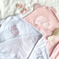 Pink and White hooded baby towels with full name and monogram options with bow embroidered above