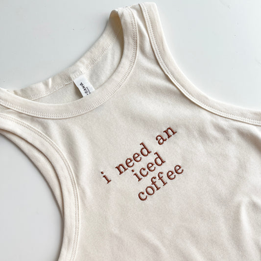 natural women's cropped micro rib tank top with custom i need an iced coffee embroidered design