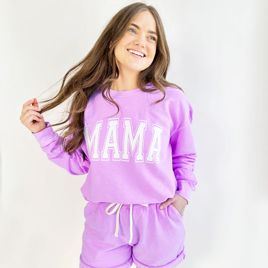 woman wearing a neon violet comfort colors mama lounge set