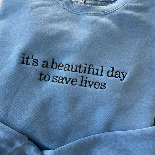 Embroidered "It's a Beautiful Day to Save Lives" Sweatshirt