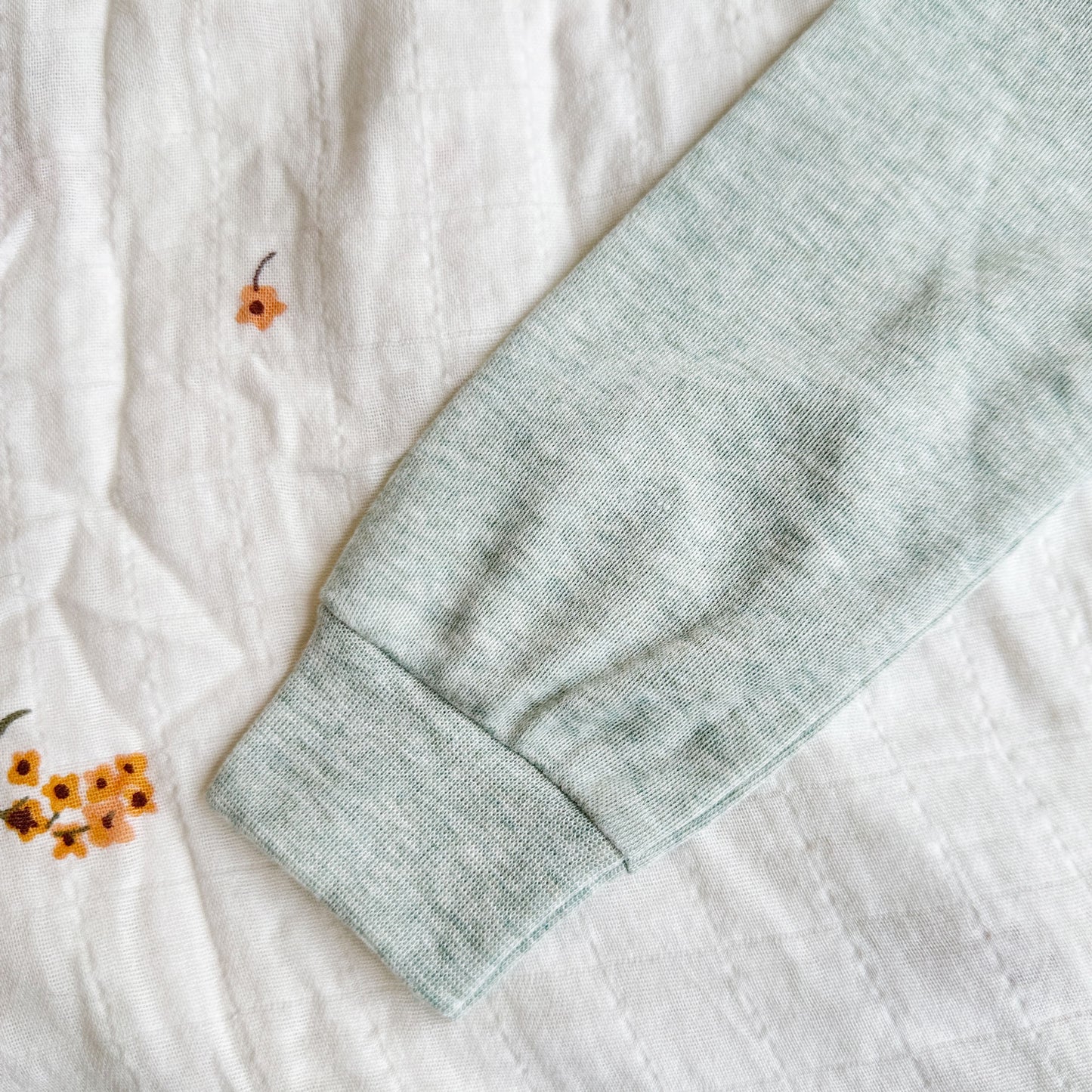 image of a cuff on an infant bubble romper