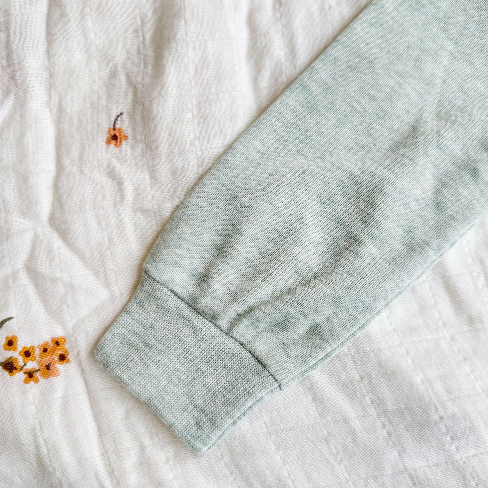 image of a cuff on an infant bubble romper