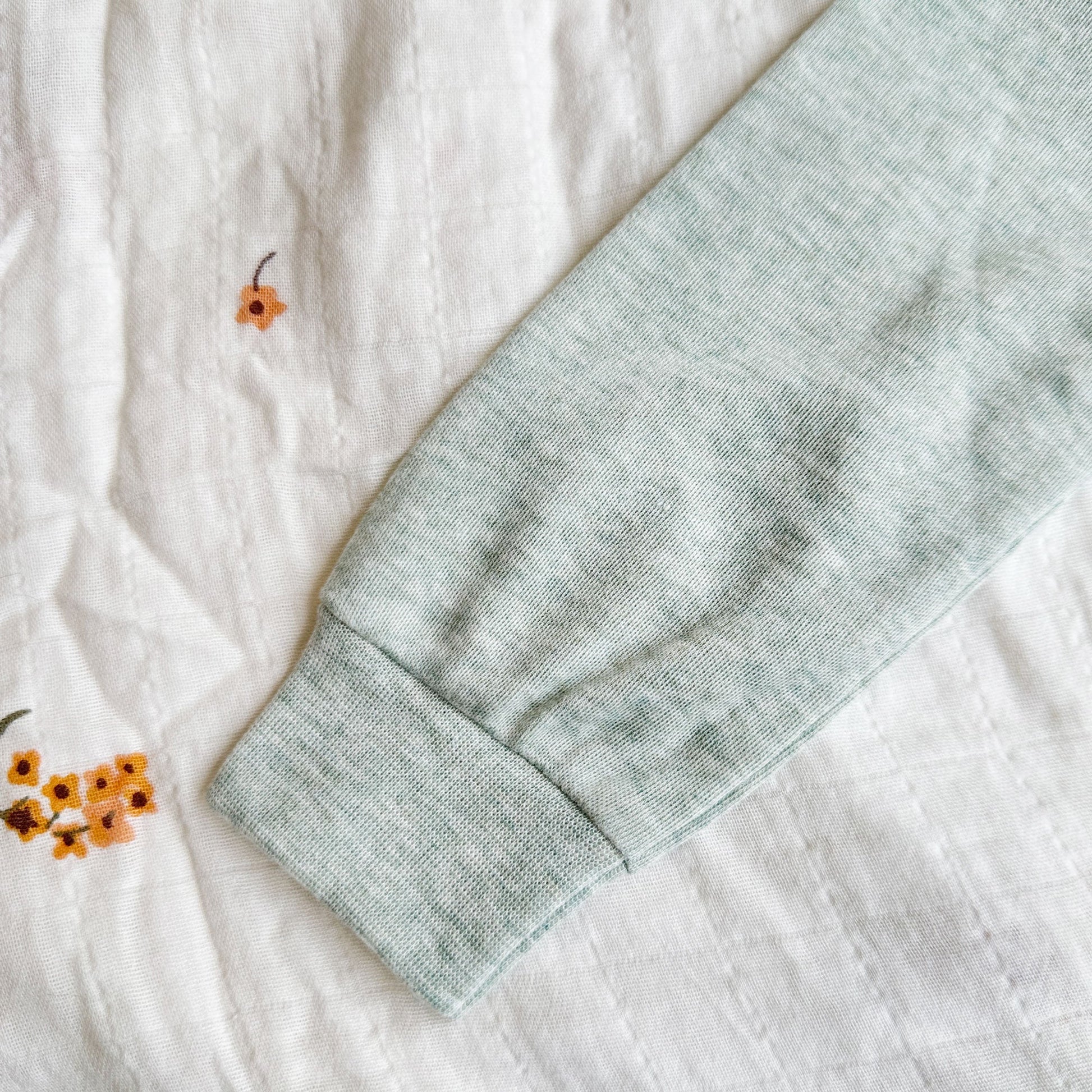 image of a cuff on an infant bubble romper