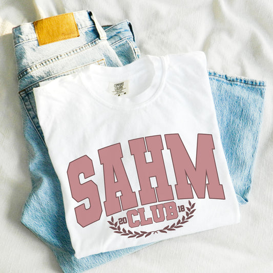 white comfort colors tee with a personalized sahm club printed design on the front in mauve