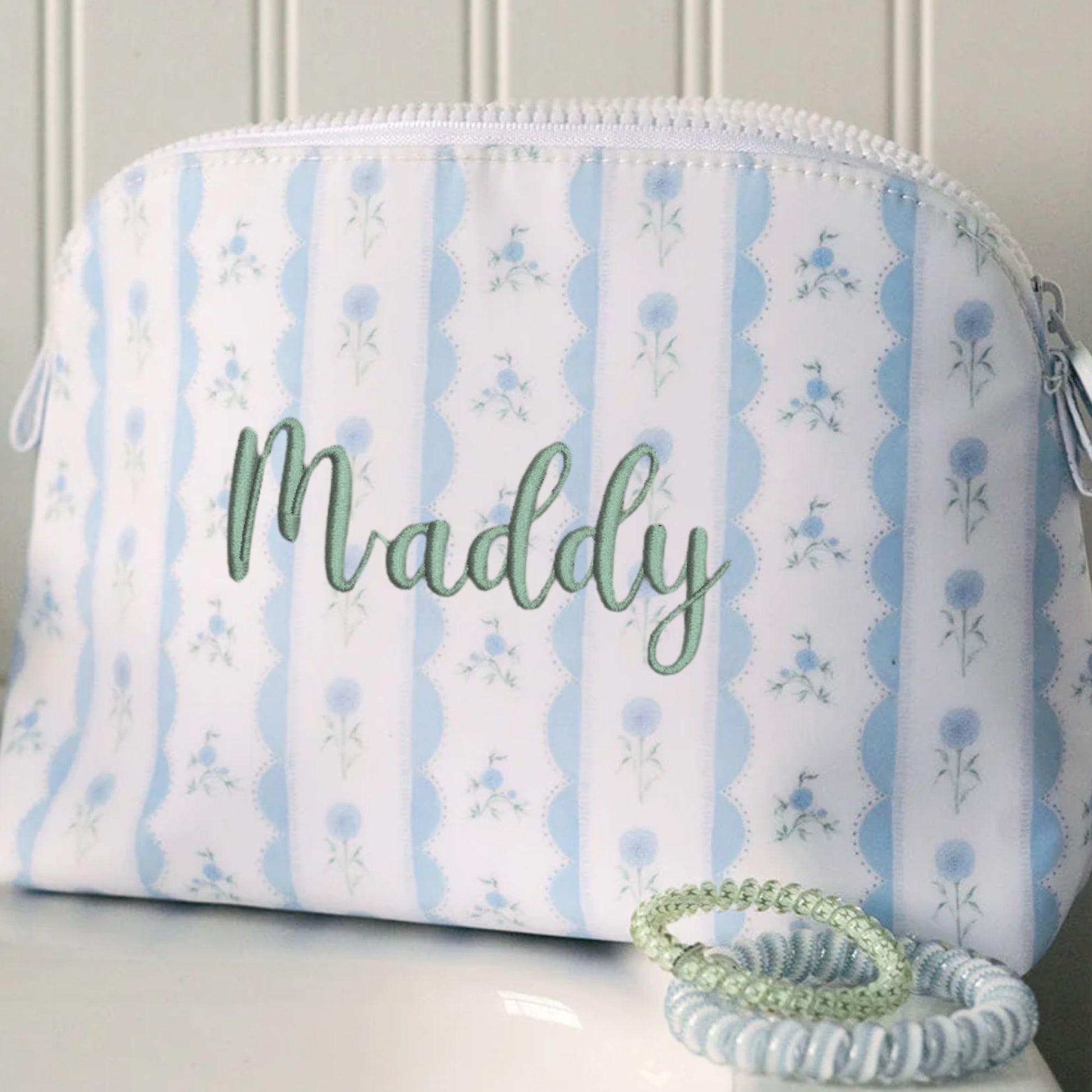ribbon floral blue goodie cosmetic pouch with custom name embroidery in eucalyptus thread