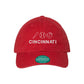 Scarlet red baseball hat with embroidered small baseball icons, bat, ball, glove, and text cincinnati under the icons in white hread 
