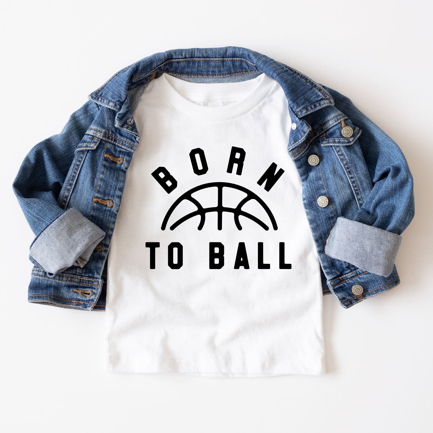 white toddler t-shirt featuring a 'born to ball' dtg print with a basketball on the center chest