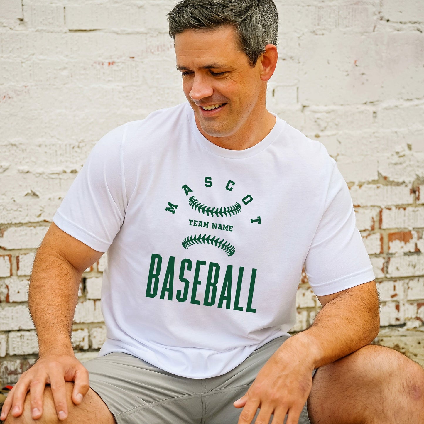 baseball dad wearing a custom t-shirt with a personalized team name and mascot printed design on the front