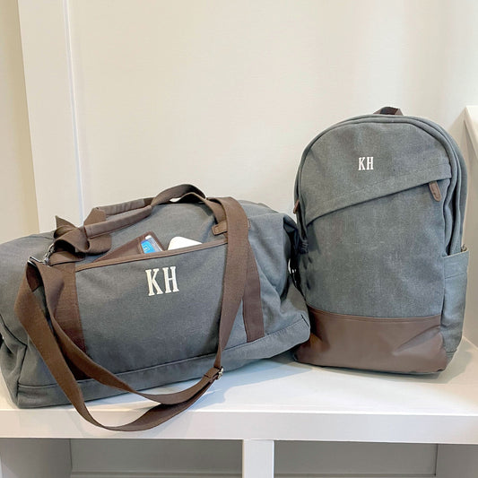 grayson backpack on bench with matching duffle