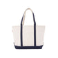 Natural tote bag with navy trim on a white background