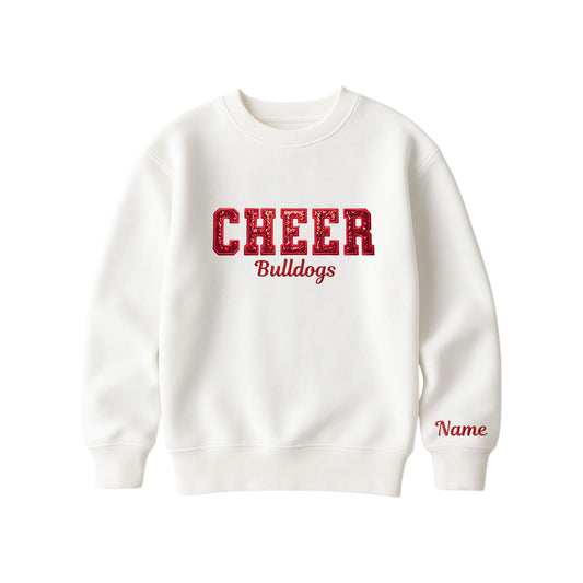 bleached linen crewneck sweatshirt with custom cheer glitter applique embroidery with Bulldogs under in script font, and optional name embroidered on the left cuff