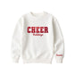 bleached linen crewneck sweatshirt with custom cheer glitter applique embroidery with Bulldogs under in script font, and optional name embroidered on the left cuff