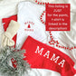 white bella and canvas t-shirt with custom merry mama and mini tree print on the left chest in red,paired with red joggers with a white mama print