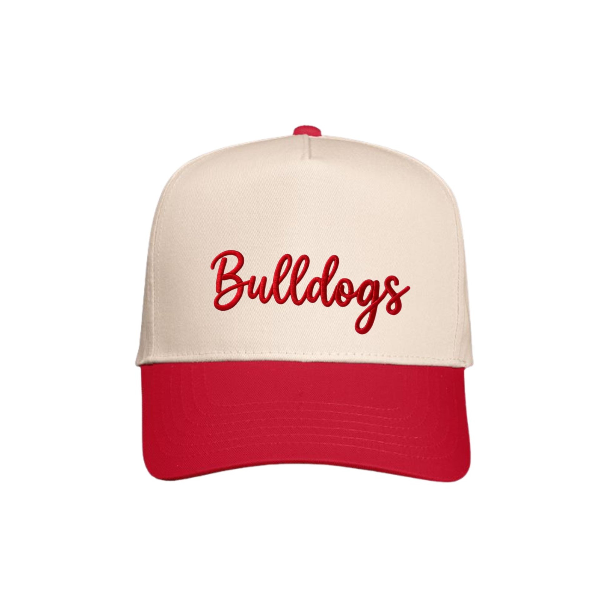 A baseball cap with an off-white crown and a red curved brim, featuring the word 'Bulldogs' embroidered in red script across the front.