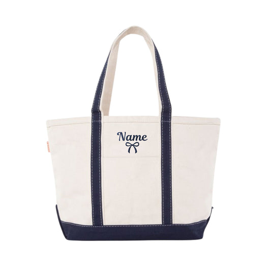 NAVYCANVAS TOTE WITH NAVY BLUE NAME AND BOW EMBROIDERED DESIGN