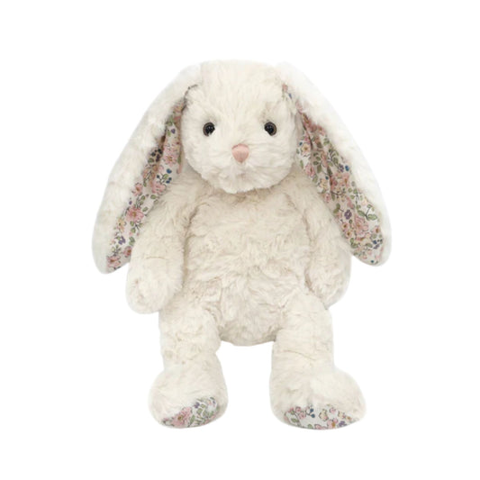 White plush bunny with floral ears on a white background