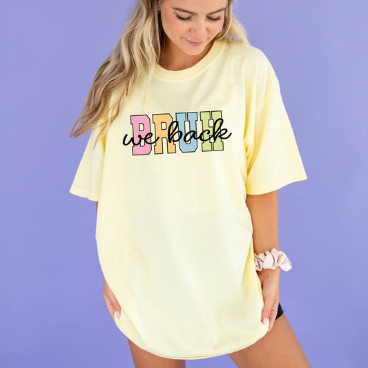 woman wearing an oversized banana comfort colors t-shirt with custom bruh we back printed design