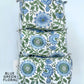 Set of three quilted pouches with blue and green floral pattern on a light blue background