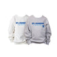 Two sweatshirts, one white and one gray, with 'St. Joseph Cavaliers' text on a white background.