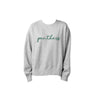 a ladies boxy athletic heather crewneck with embroidered panthers design in script font on the front center chest with hunter green thread