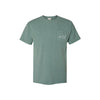 Green t-shirt with a small st. pius panthers logo embroidered in white thread on the chest pocket