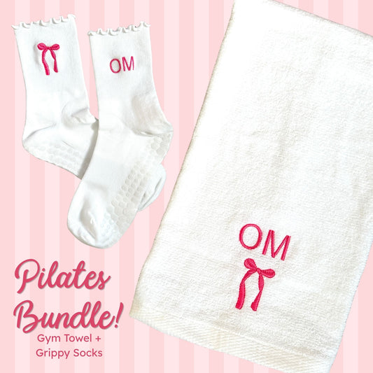 white ruffle grip socks with custom bow and initial embroidery and a white gym towel with initial and bow embroidery in pink thread
