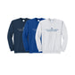 Three crewneck sweatshirts displayed side by side on a white background: one navy blue, one royal blue, and one light heather gray. Each sweatshirt features the text 'VILLA MADONNA MONTESSORI' and a small cross logo printed on the chest.