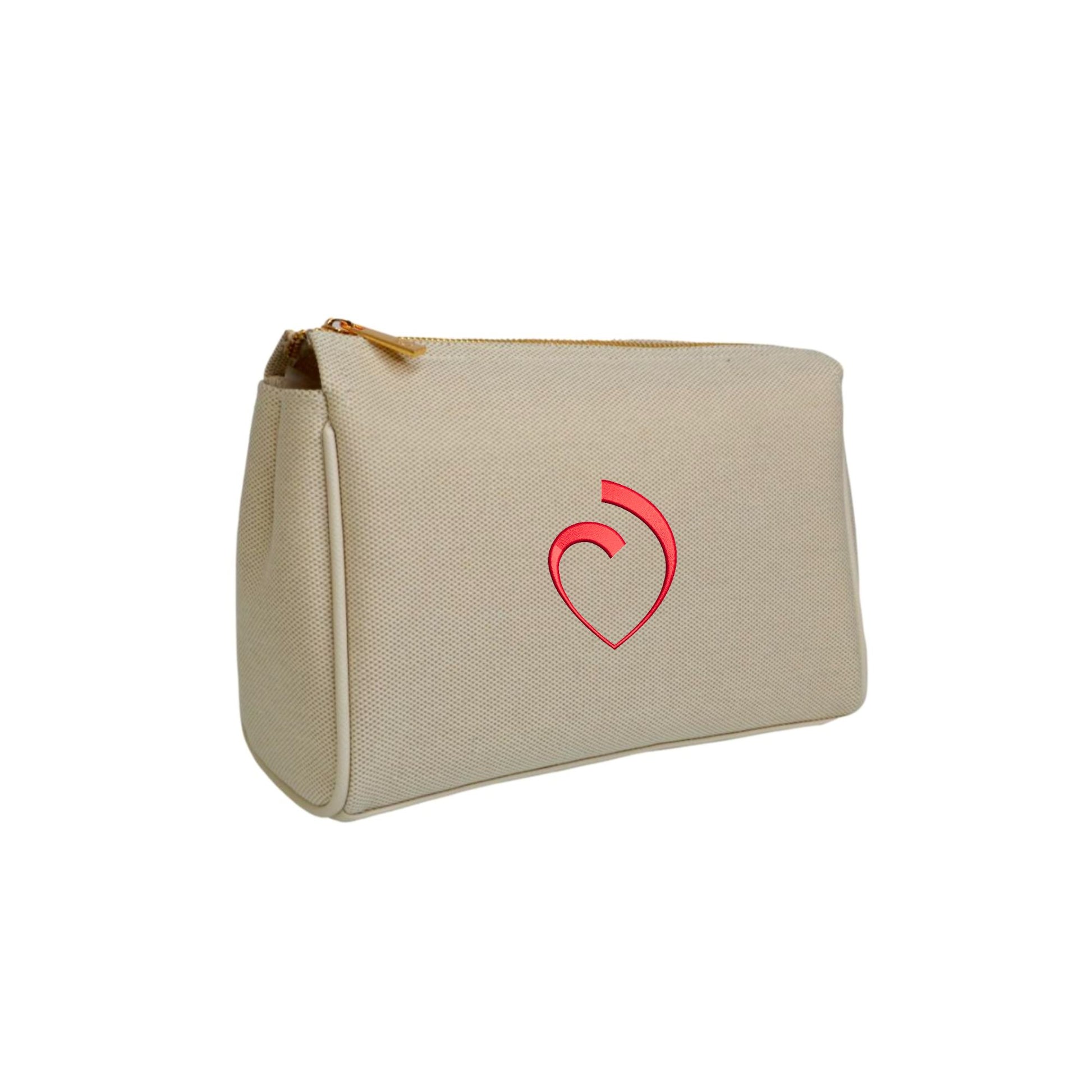 LUXE LINEN MEDIUM VOYAGE MAKE UP BAG IN SAND WITH CUSTOM EMBROIDERED SACRED HEART SCHOOLS HEART LOGO IN RED THREAD