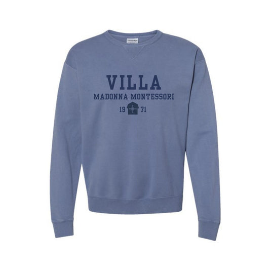 Blue sweatshirt with 'Villa Madonna Montessori' text on a white background