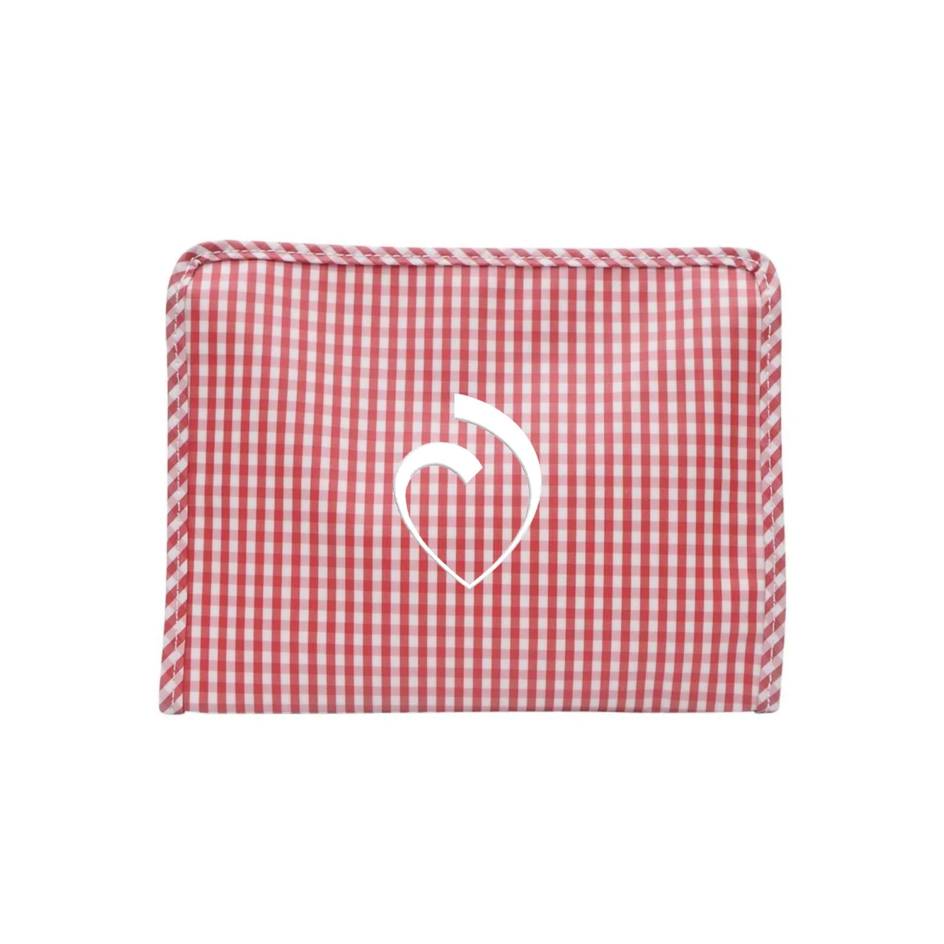 Red gingham makeup pouch with custom sacred heart schools heart logo embroidered on the front center in white thread