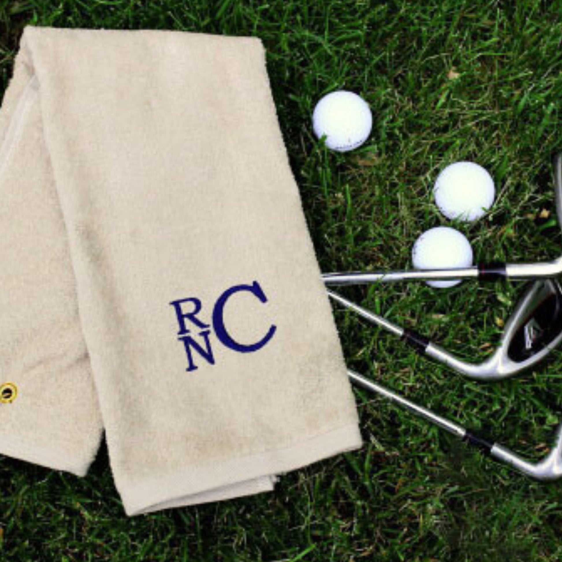 khaki golf towel with custom embroidered monogram in navy thread