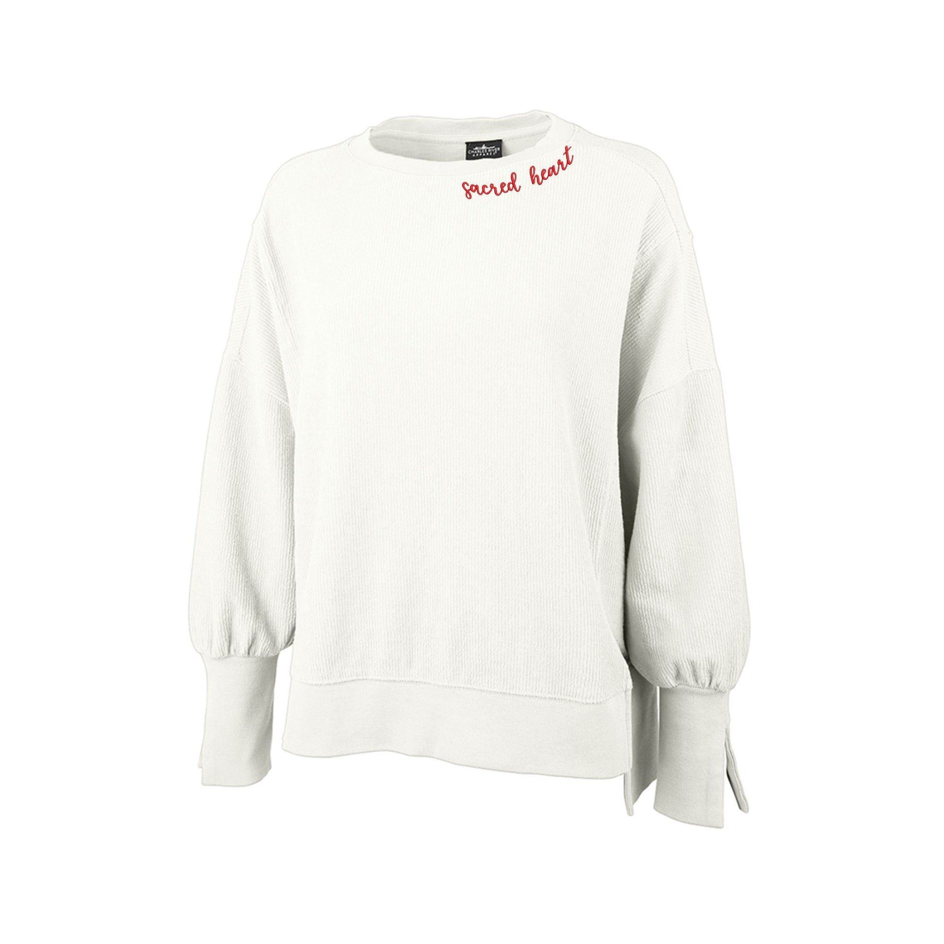 corded bone spliced crew neck pullover with sacred heart embroidered along the neckline in a script font and red thread