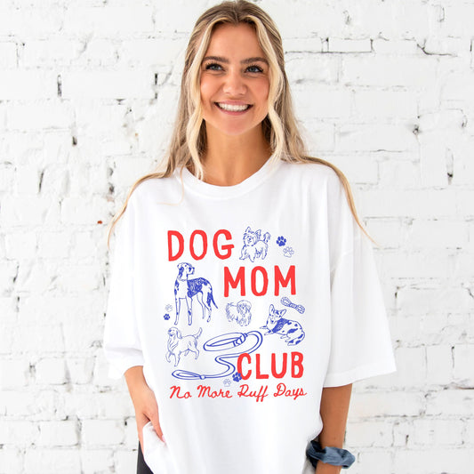 girl wearing oversized white comfort colors t-shirt with a large dog mom club dog doodle print 